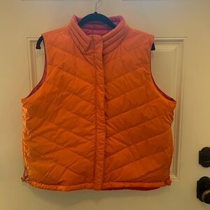 Coldwater Creek. Reverse-able pink and orange puffer vest with pockets. Size L